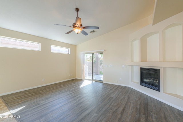 unfurnished living room featuring ceiling fan, dark hardwood / wood-style floors, and lofted ceiling