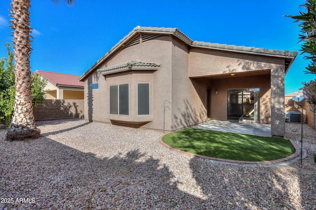 rear view of house featuring a patio area