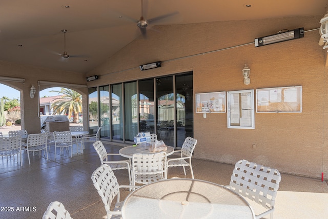 view of patio featuring ceiling fan