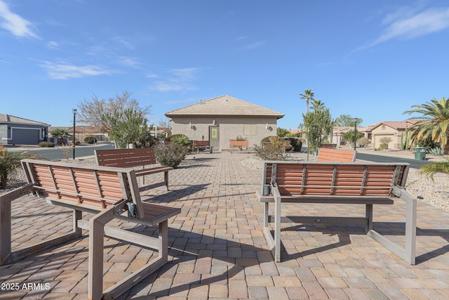 view of community with a patio