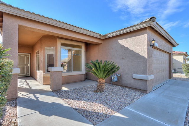 view of property exterior featuring a garage