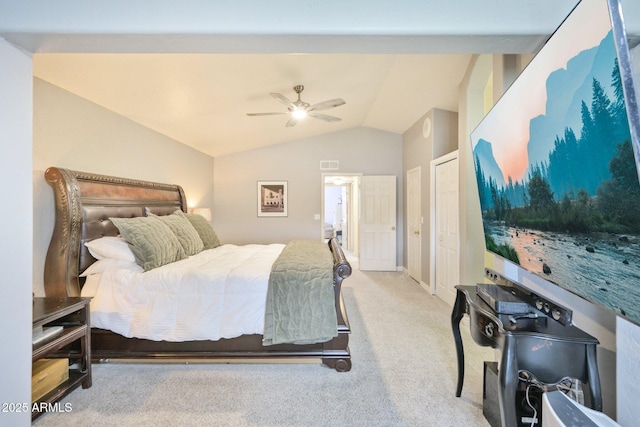 bedroom featuring lofted ceiling, carpet floors, and ceiling fan