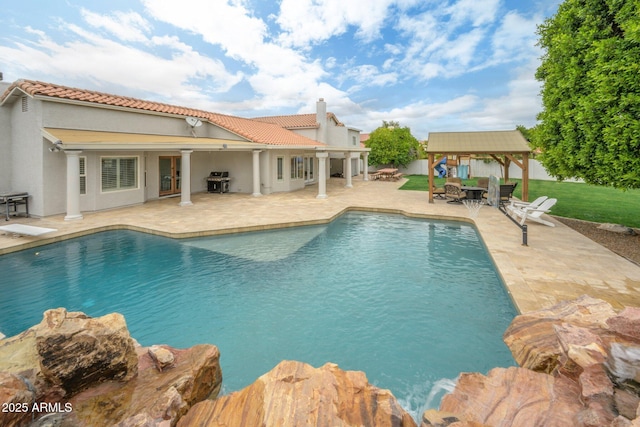 view of pool featuring a gazebo, a patio, and area for grilling