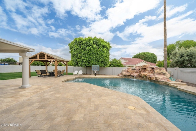 view of swimming pool featuring a gazebo, a patio area, and a fenced backyard