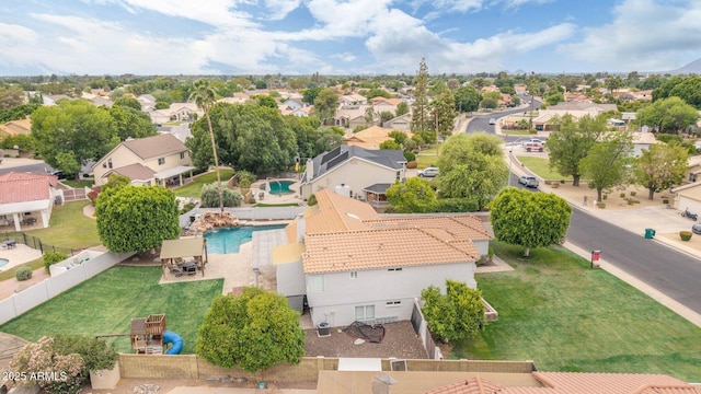 aerial view of residential area with a pool area