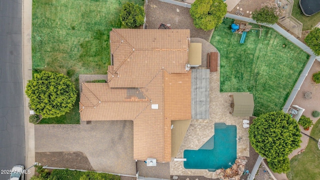 view of subject property with a pool area