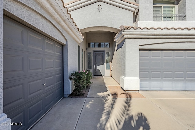 entrance to property featuring a garage