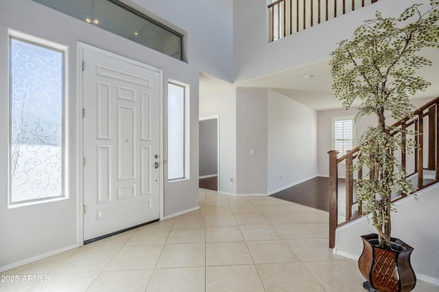 entryway featuring light tile patterned floors