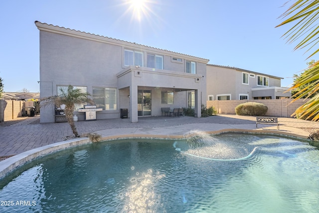 view of pool featuring a patio