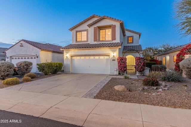 view of front of property with a garage