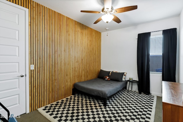 bedroom featuring a ceiling fan and tile patterned floors