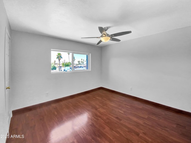 1750 E Mateo Cir Unit 103, Mesa, AZ 85204 - empty room with dark wood-style floors and a ceiling fan