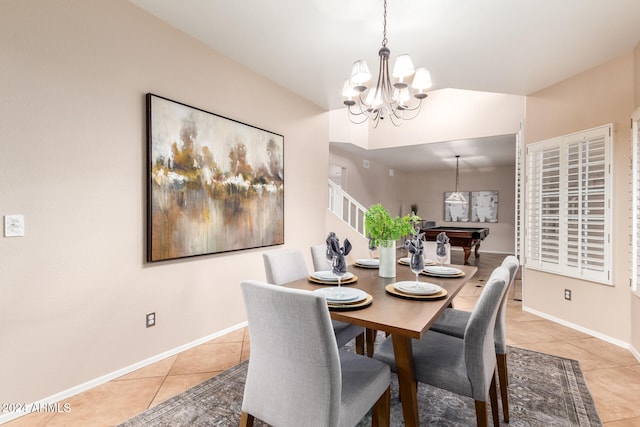 tiled dining space with billiards and lofted ceiling