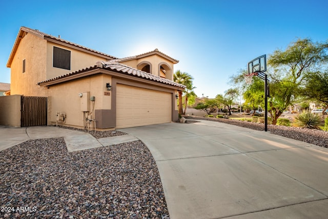 view of side of home with a garage