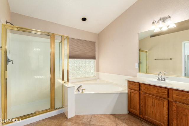 bathroom with separate shower and tub, lofted ceiling, tile patterned floors, and vanity