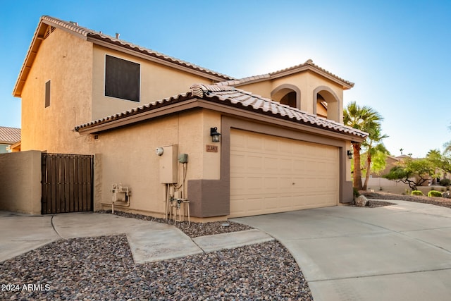 view of property exterior featuring a garage