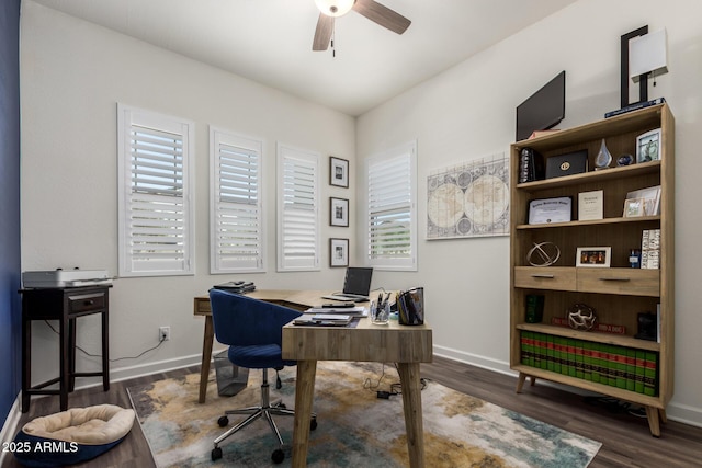 office area featuring ceiling fan, wood finished floors, and baseboards