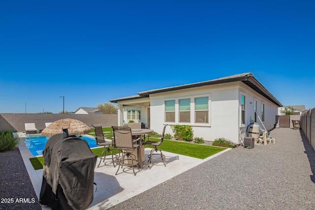 view of patio / terrace featuring a fenced backyard and outdoor dining area