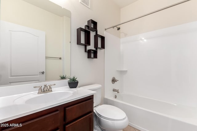 bathroom with visible vents, toilet, vanity, and washtub / shower combination