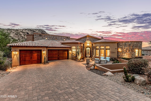 view of front of property with a garage