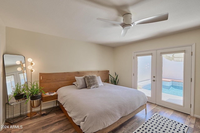 bedroom with french doors, access to exterior, and hardwood / wood-style floors