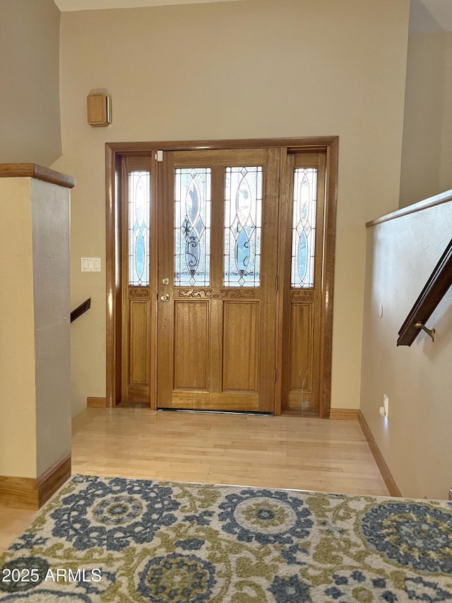 5408 Corda Ln, Show Low, AZ 85901 - entryway featuring baseboards and light wood-style flooring