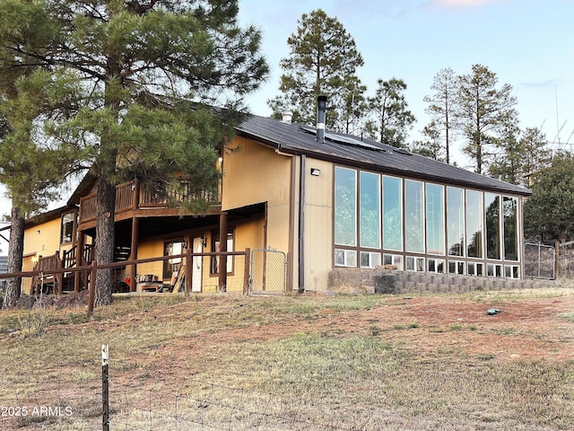 5408 Corda Ln, Show Low, AZ 85901 - view of outbuilding featuring a sunroom and fence