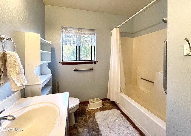 5408 Corda Ln, Show Low, AZ 85901 - bathroom featuring stone finish floor, toilet, baseboards, vanity, and shower / bathtub combination with curtain
