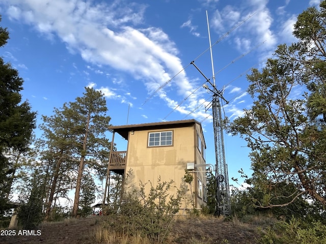 5408 Corda Ln, Show Low, AZ 85901 - view of side of home featuring a balcony