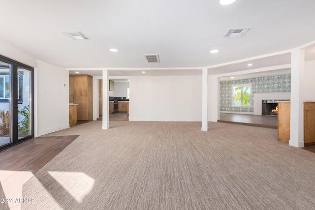 interior space featuring light colored carpet