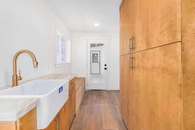 kitchen featuring a center island and sink