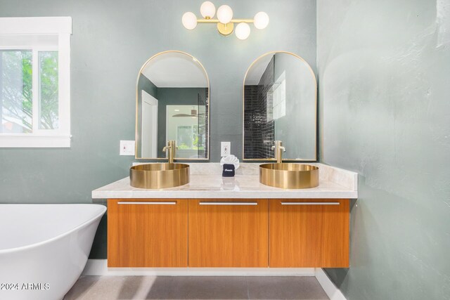 bathroom featuring vanity and a bathing tub