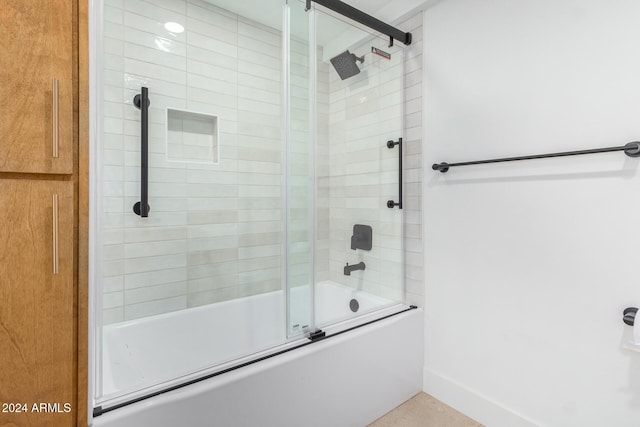 bathroom featuring enclosed tub / shower combo