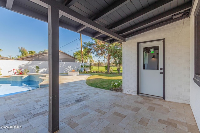 view of patio / terrace featuring a fenced in pool