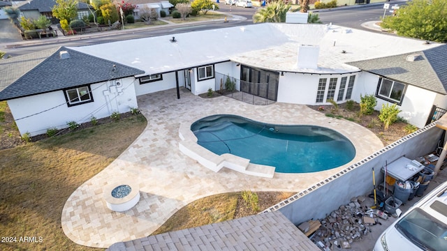 view of swimming pool with a patio