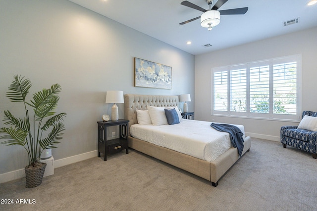 bedroom featuring ceiling fan and light colored carpet