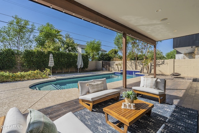 view of pool featuring a patio area