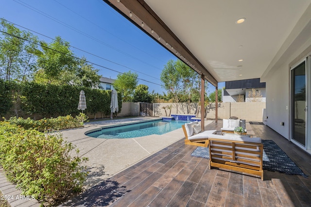 view of pool featuring a patio area