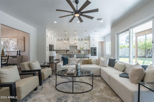 living room featuring ceiling fan