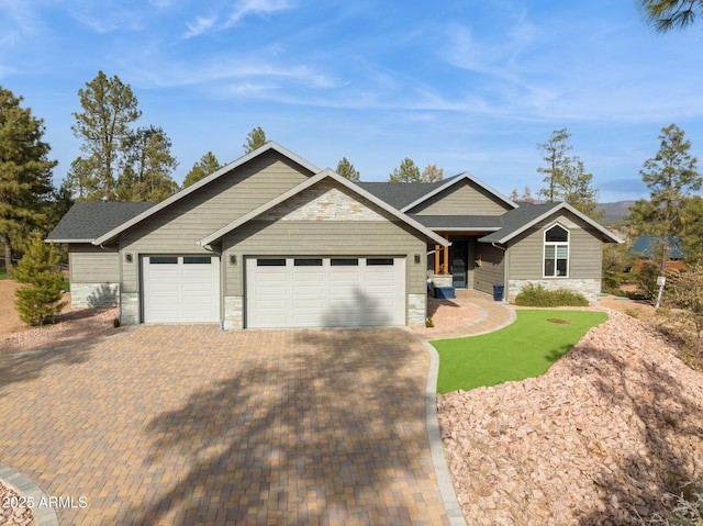 ranch-style home with a garage