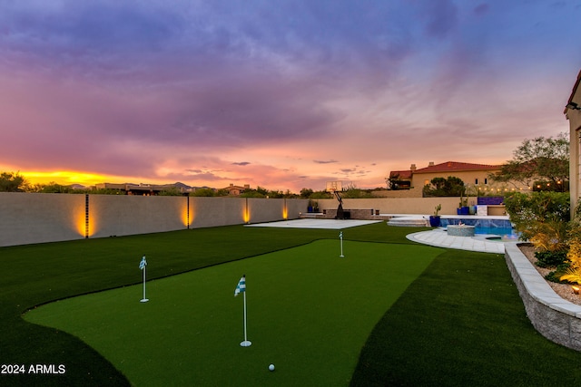 view of property's community featuring a pool and a patio area