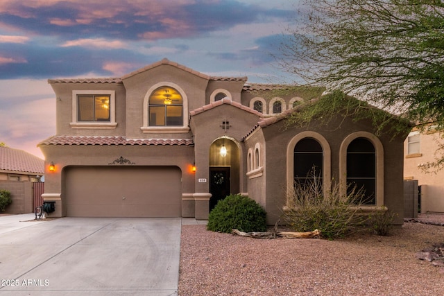 654 E Taylor Trl, San Tan Valley, AZ 85143 - mediterranean / spanish-style home featuring stucco siding, driveway, a garage, and a tile roof