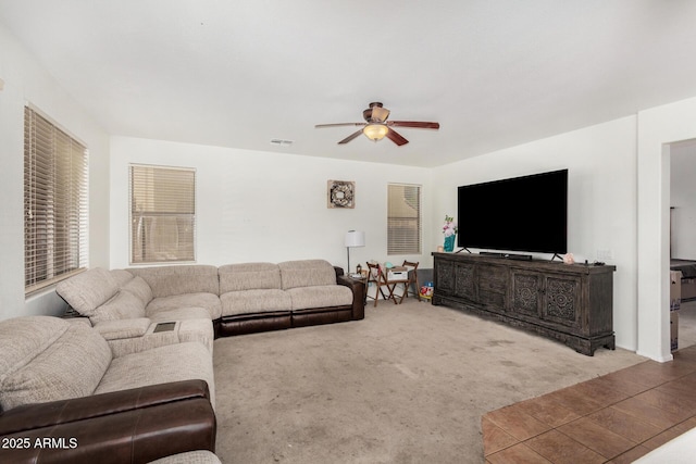 654 E Taylor Trl, San Tan Valley, AZ 85143 - carpeted living area featuring a ceiling fan