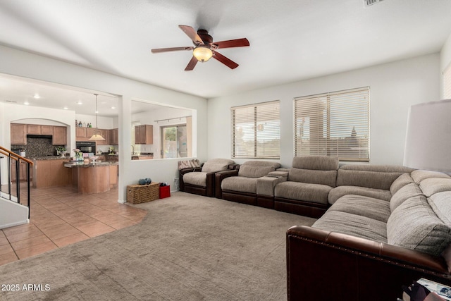 654 E Taylor Trl, San Tan Valley, AZ 85143 - living room with ceiling fan, light tile patterned flooring, and stairs