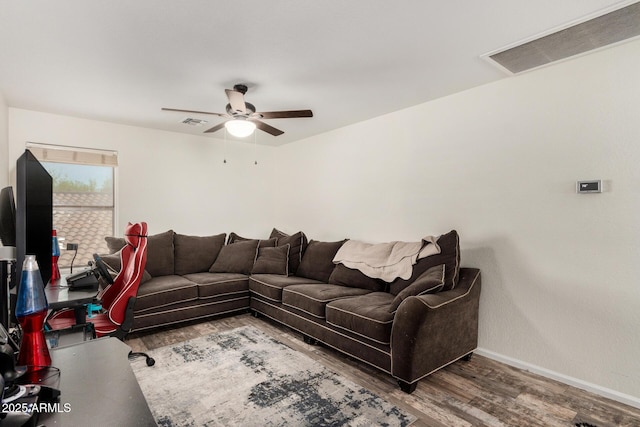 654 E Taylor Trl, San Tan Valley, AZ 85143 - living room with wood finished floors, a ceiling fan, and baseboards