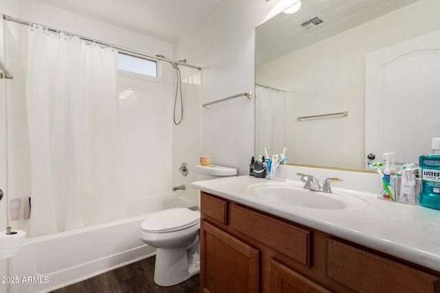 654 E Taylor Trl, San Tan Valley, AZ 85143 - bathroom featuring vanity, shower / tub combo with curtain, wood finished floors, and toilet