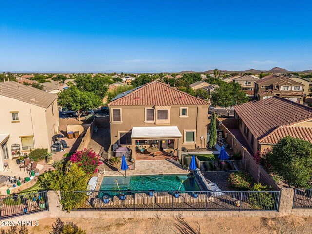 654 E Taylor Trl, San Tan Valley, AZ 85143 - rear view of property featuring a fenced backyard, stucco siding, a residential view, and a patio