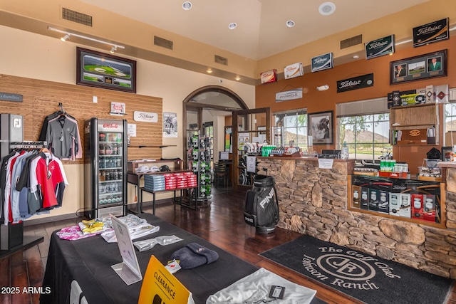 654 E Taylor Trl, San Tan Valley, AZ 85143 - living area featuring hardwood / wood-style flooring, wine cooler, recessed lighting, and a towering ceiling