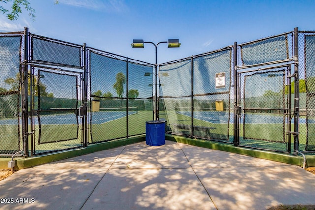 654 E Taylor Trl, San Tan Valley, AZ 85143 - view of tennis court with a gate