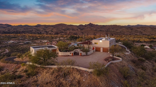 aerial view at dusk with a mountain view